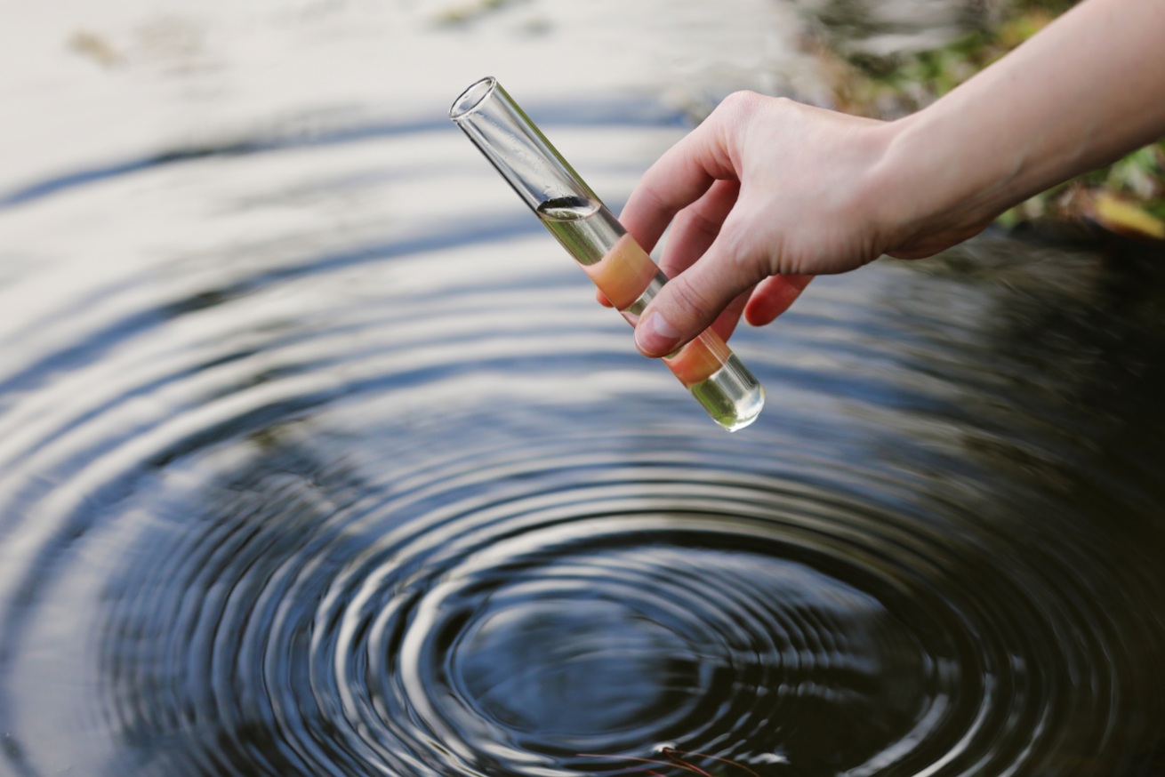 Woman hand Clear water